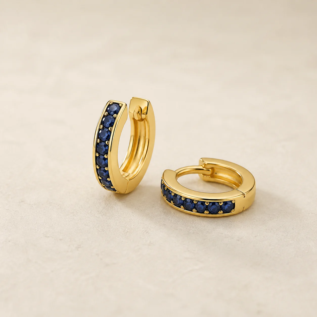 Nocturne Sapphire Huggies from the Maison Burford collection