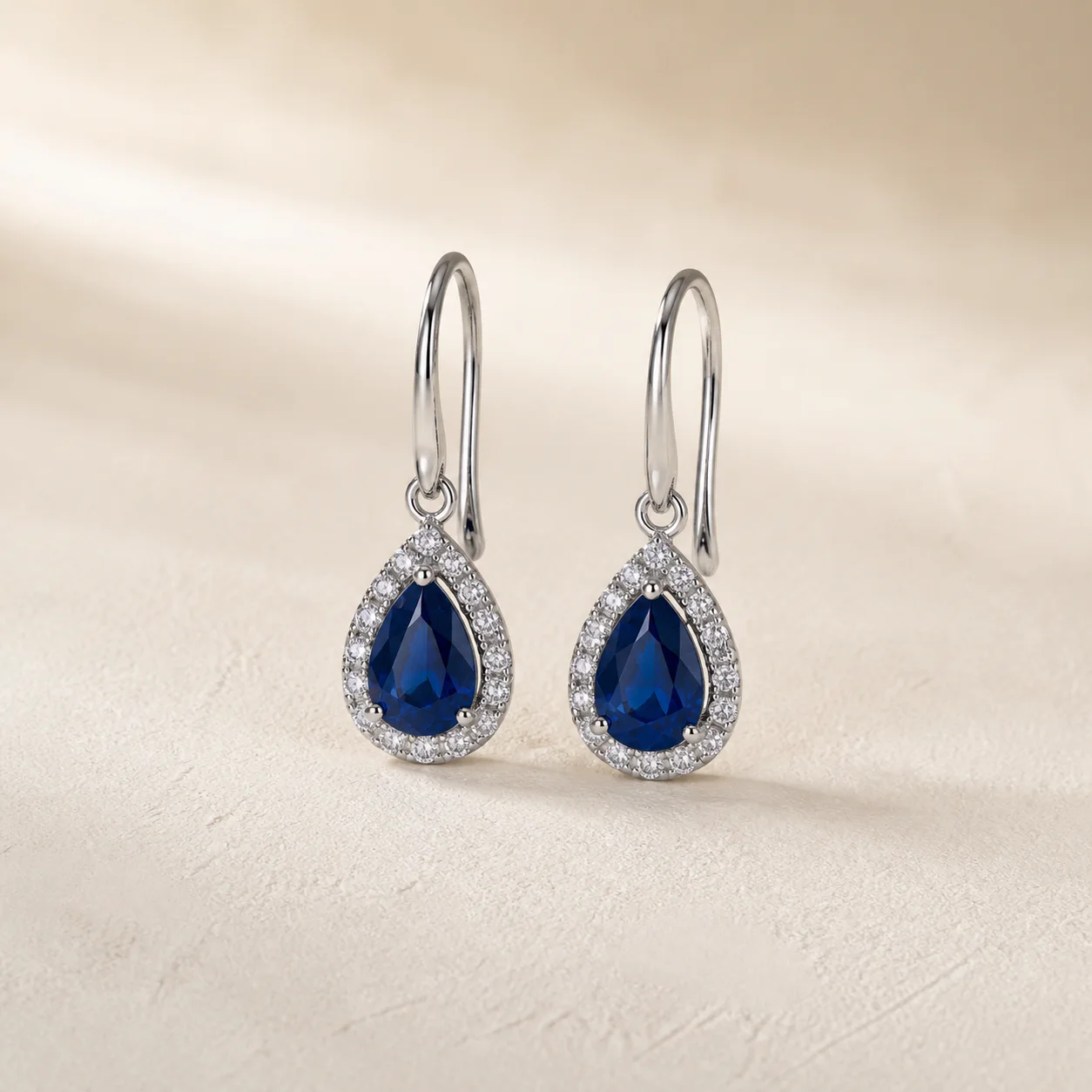Sapphire Halo Drop Earrings from the Maison Burford collection